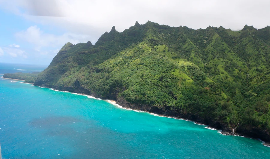 This photo provided by the Hawaii department of Land and Natural Resources shows an area over Napali Coast State Wilderness Park where search and rescue are searching for a tour Helicopter that disappeared in Hawaii with several people aboard on Friday, Dec. 27, 2019. (AP)