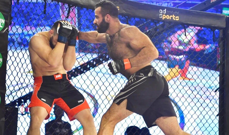 Saudi fighter battles through broken rib to triumph at MMA event