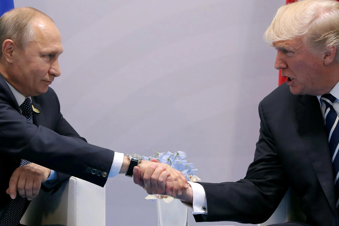US President Donald Trump shakes hands with Russian President Vladimir Putin during the their bilateral meeting at the G20 summit in Hamburg. (Reuters/File Photo)