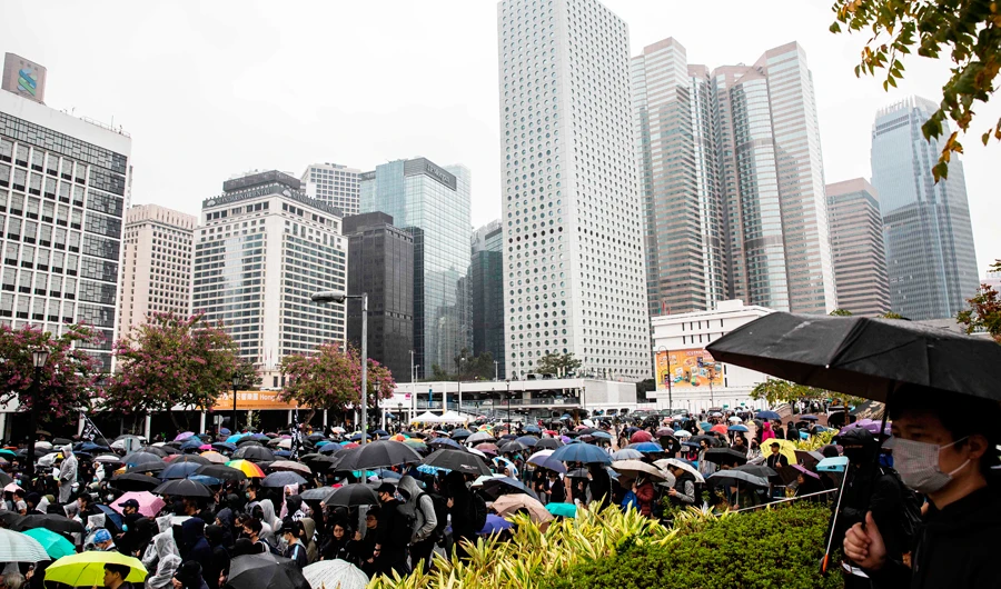More than 1,000 gather for rain-soaked Hong Kong rally