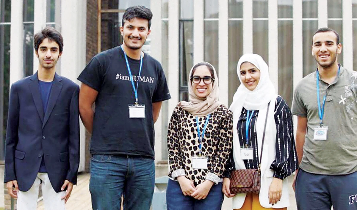 Saudi peace activist Naif Al-Harbi, second left, at the Emerging Peacemakers event at Cambridge University. Al-Harbi took to social media to recruit people to his cause. (Photos/Supplied )