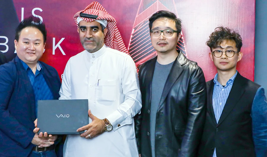 From left, John Lee, Hassan Obaidan and Calvin Kong at the launch ceremony.
