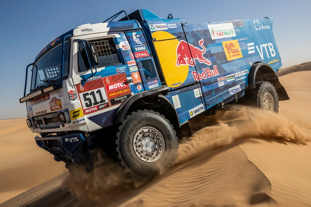 Driver Andrey Karginov, of Russia, and co-drivers Igor Leonov, of Russia, and Andrey Mokeev, of Russia, race their Kamaz truck during Stage 8 of the Dakar Rally in Wadi Al Dawasir. (AP Photo)