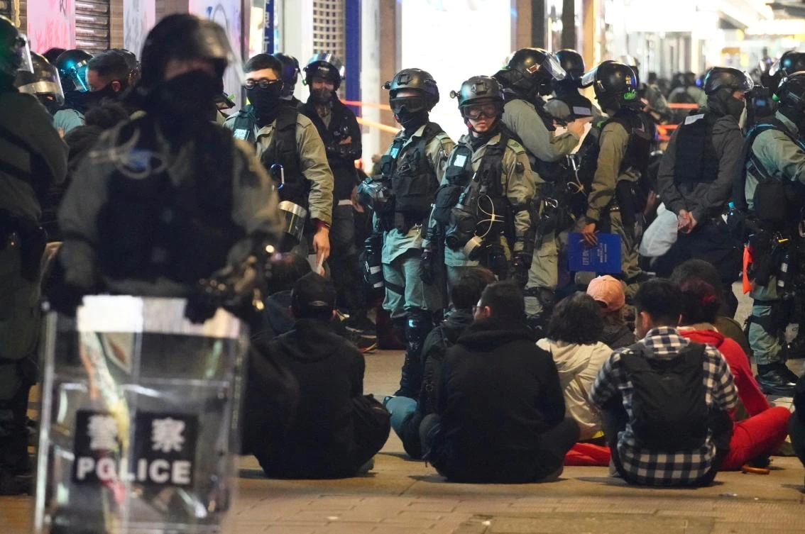 Police detain protesters in Hong Kong, Wednesday, Jan. 1, 2020. Hong Kong toned down its New Year's celebrations amid the protests that began in June and which have dealt severe blows to the city’s retail, tourism and nightlife sectors. (AP)