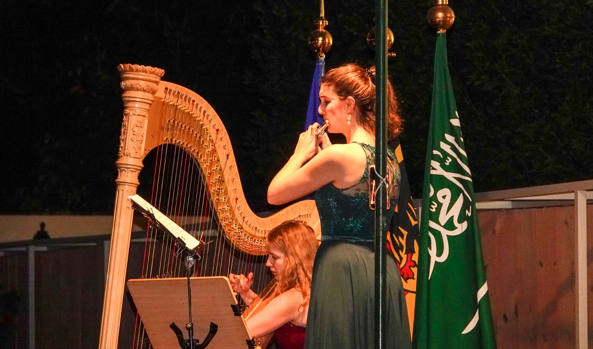 Lea Maria Loffler on the harp while Myriam Ghani plays the flute at a concert in Jeddah. (AN photo by Huda Bashatah)