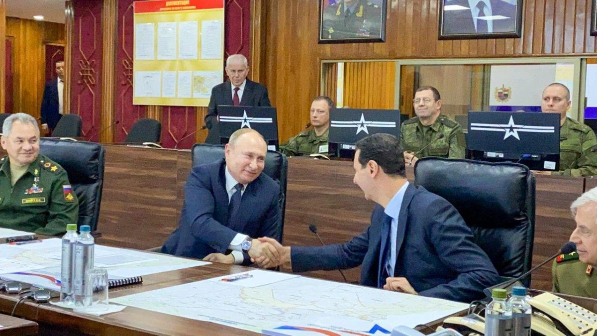 Vladimir Putin meets Assad on rare trip to Syria
