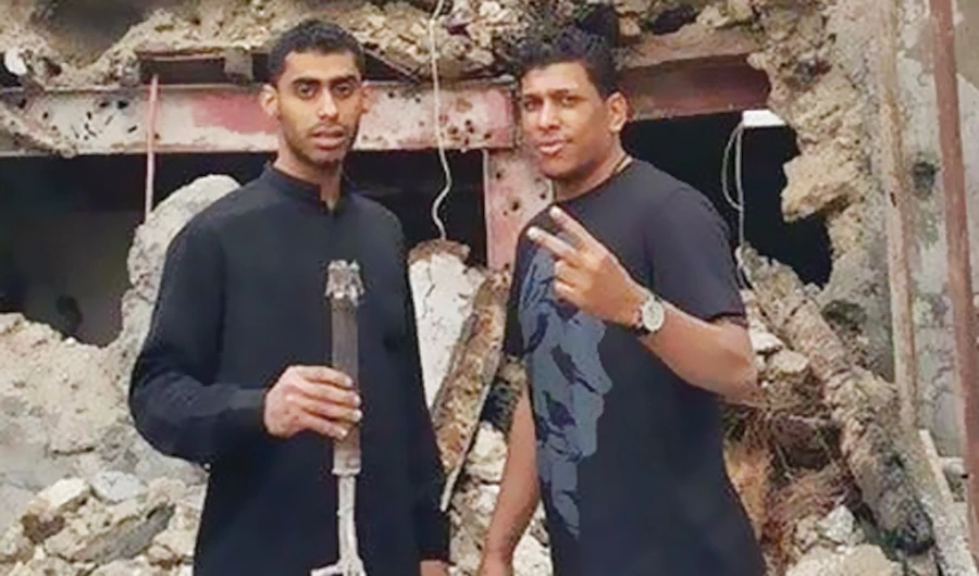 Mohammed Hussein Al-Ammar, right, in an undated photo. (Social media)
