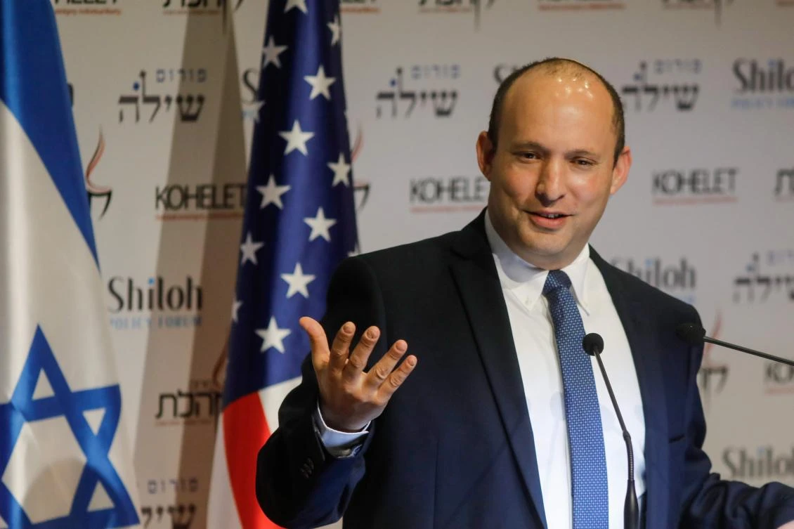 Isreali Defense Minister Naftali Bennett speaks at the Kohelet Policy Forum conference in Jerusalem, on January 8, 2020. (AFP)
