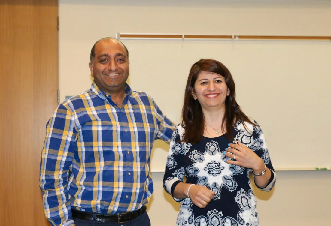 University of Alberta professors Mojgan Daneshmand and Pedram Mousavi, pose in an undated family photo in Edmonton, Alberta, Canada. (Handout via Reuters)