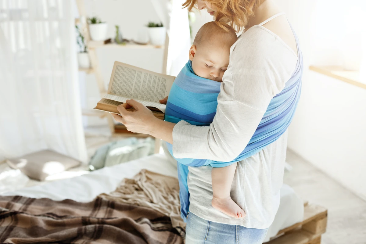 The fabric of a sling or carrier should not close around them so you have to open it to check on them. (Shutterstock)