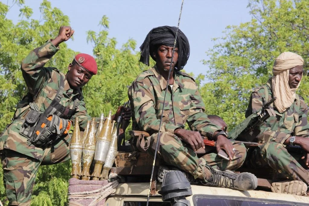Soldiers belonging to the Joint Task Force patrol Monguno in Borno state on December 15, 2019. (AFP)
