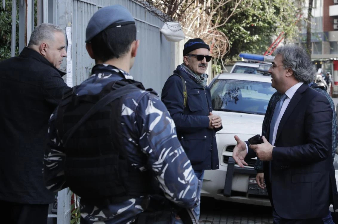 Carlos Abou Jaoude, right, one of the lawyers representing fugitive former Renault-Nissan boss Carlos Ghosn in Lebanon enters the prosecutor’s office in Beirut on January 9, 2020. (AFP)