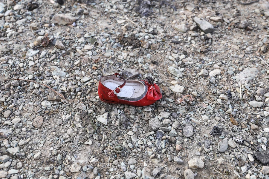 A child's shoe is pictured on January 8, 2020 at the scene of a Ukrainian airliner that crashed shortly after take-off near Imam Khomeini airport in the Iranian capital Tehran. (AFP)