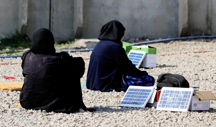 Solar panels came as a relief for the people at Iraq’s Bahirka Refugee Camp in Erbil. A single solar power panel lights up to two lamps and charges more than one mobile phone. (Getty Images)