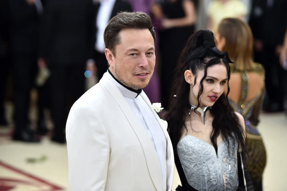 Elon Musk, singer Grimes tease fans with baby bump photo