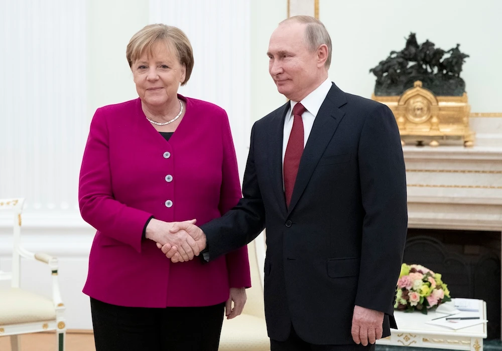 Germany's chancellor Angela Merkel said on Saturday Berlin would host a Libya peace summit, following a meeting in Moscow with Russian president Vladimir Putin. (Reuters)