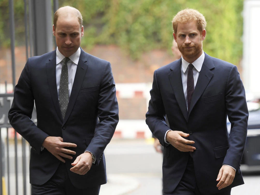 In this Tuesday, Sept. 5, 2017 file photo, Britain's Prince William, the Duke of Cambridge, left, and Prince Harry arrive to visit the Support4Grenfell Community Hub in London. (AP)