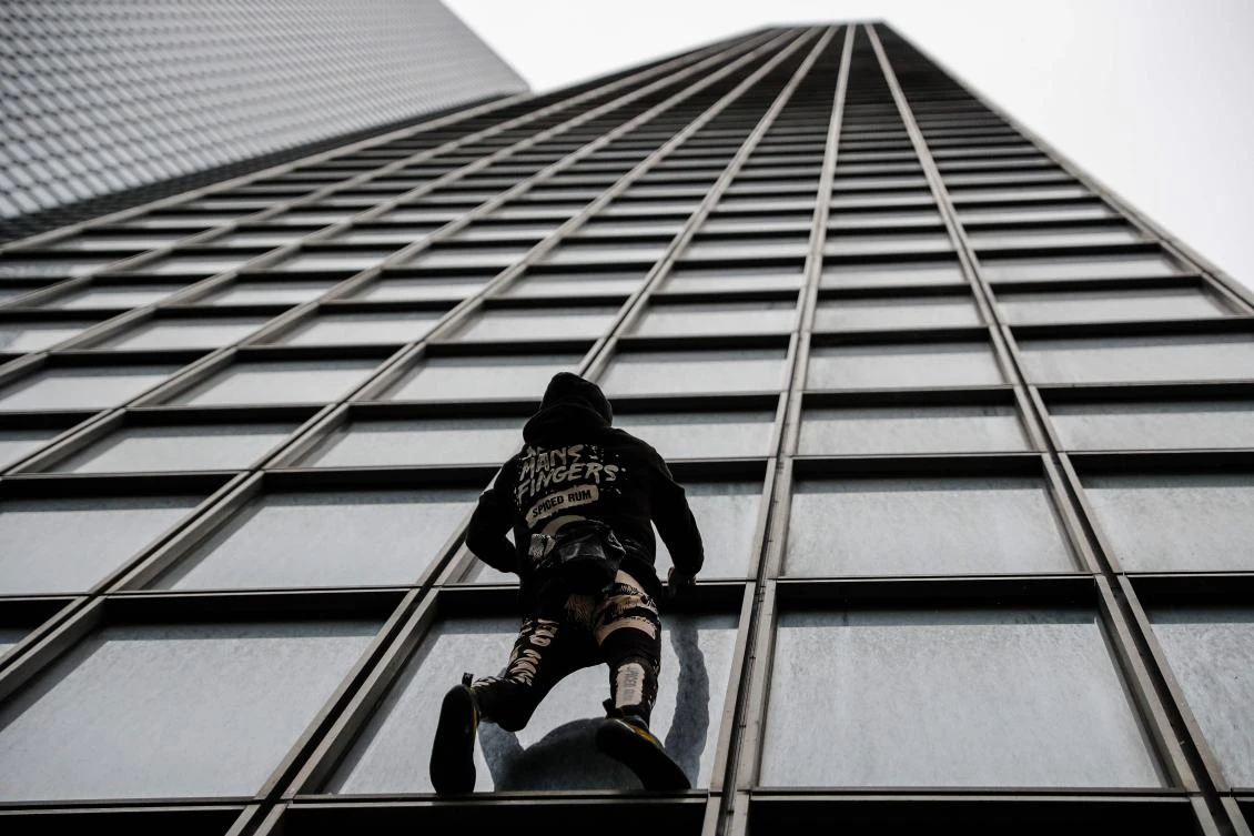 French ‘Spiderman’ stages protest climb against pension reform
