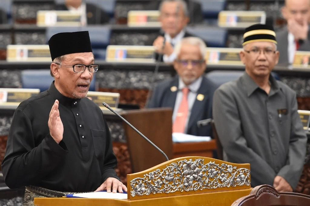 Anwar Ibrahim was first thrown in jail in the 1990s after being sacked from his position in government by Mahathir Mohamad. (AFP)
