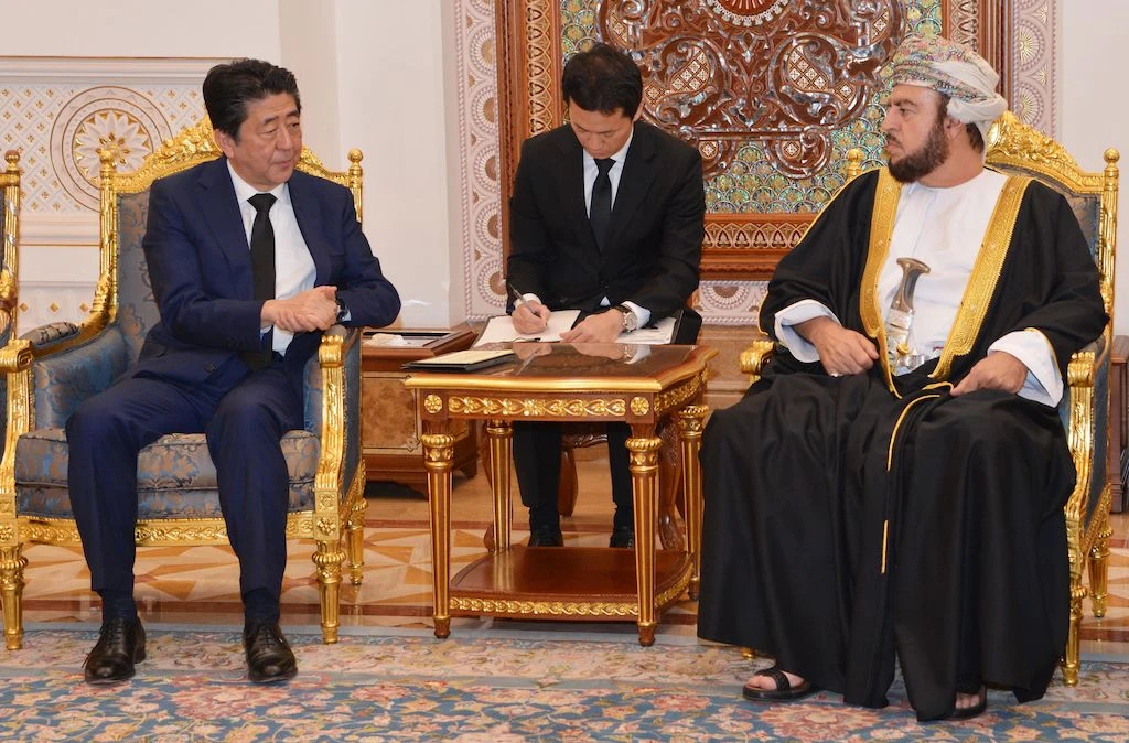 A handout picture released by the Omani News Agency shows Asaad bin Tariq al-Said (R), brother of Oman's new leader, meeting with Prime Minister of Japan Shinzo Abe in the capital Muscat on January 14, 2020. (AFP)