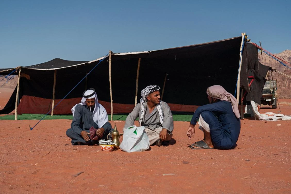 Resting after setting up a Bedouin tent for the Regional Gathering in Jordan. (Photo: Stamos Abatis for CCP)