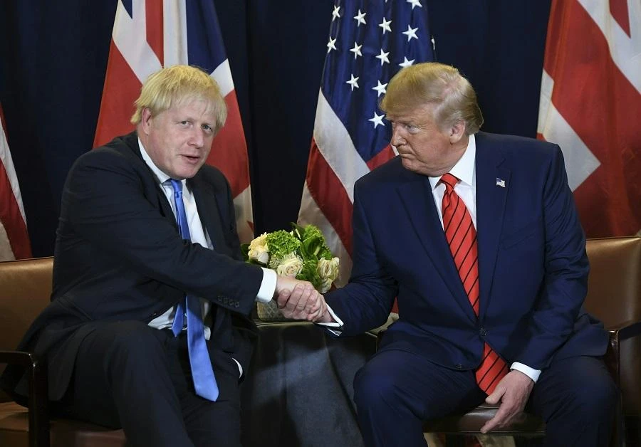 US President Donald Trump and British Prime Minister Boris Johnson hold a meeting at UN Headquarters in New York, September 24, 2019. (File/AFP)
