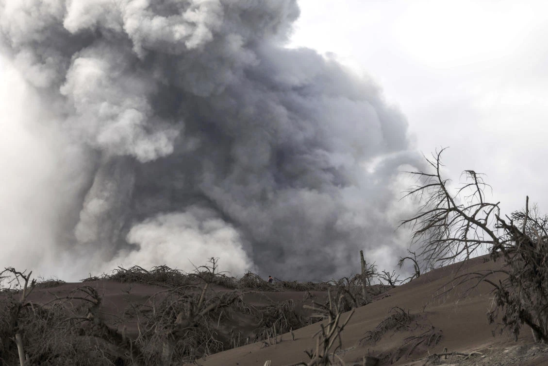 Tens of thousands of people fled villages darkened and blanketed by heavy ash. (File/AP)