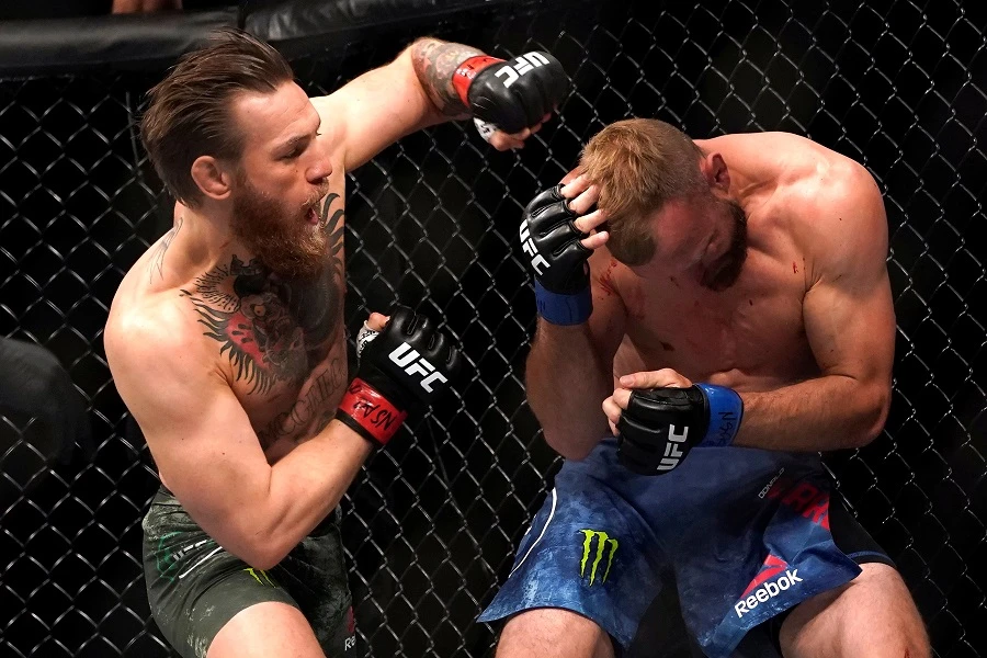 McGregor stopped Donald Cerrone with a head kick and punches 40 seconds into the first round at UFC 246. (Reuters)