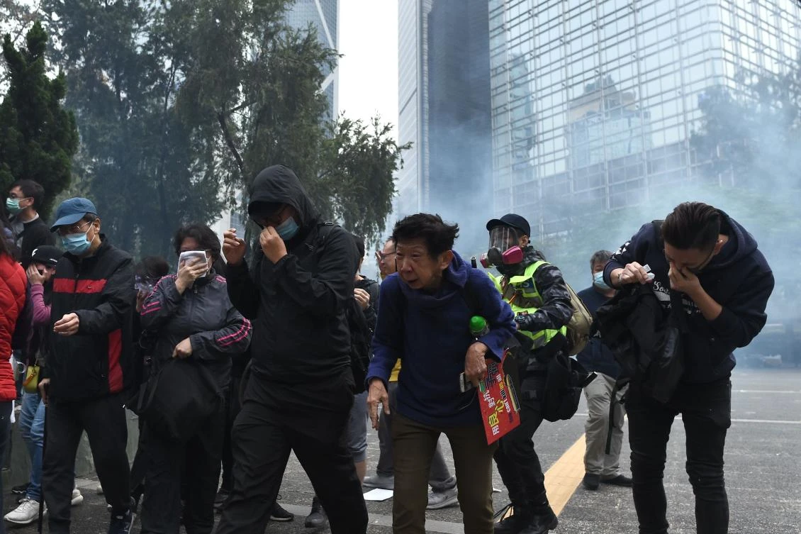 Hong Kong police intervened promptly when the rally turned into an impromptu march, saying previous marches have turned violent. (AFP)