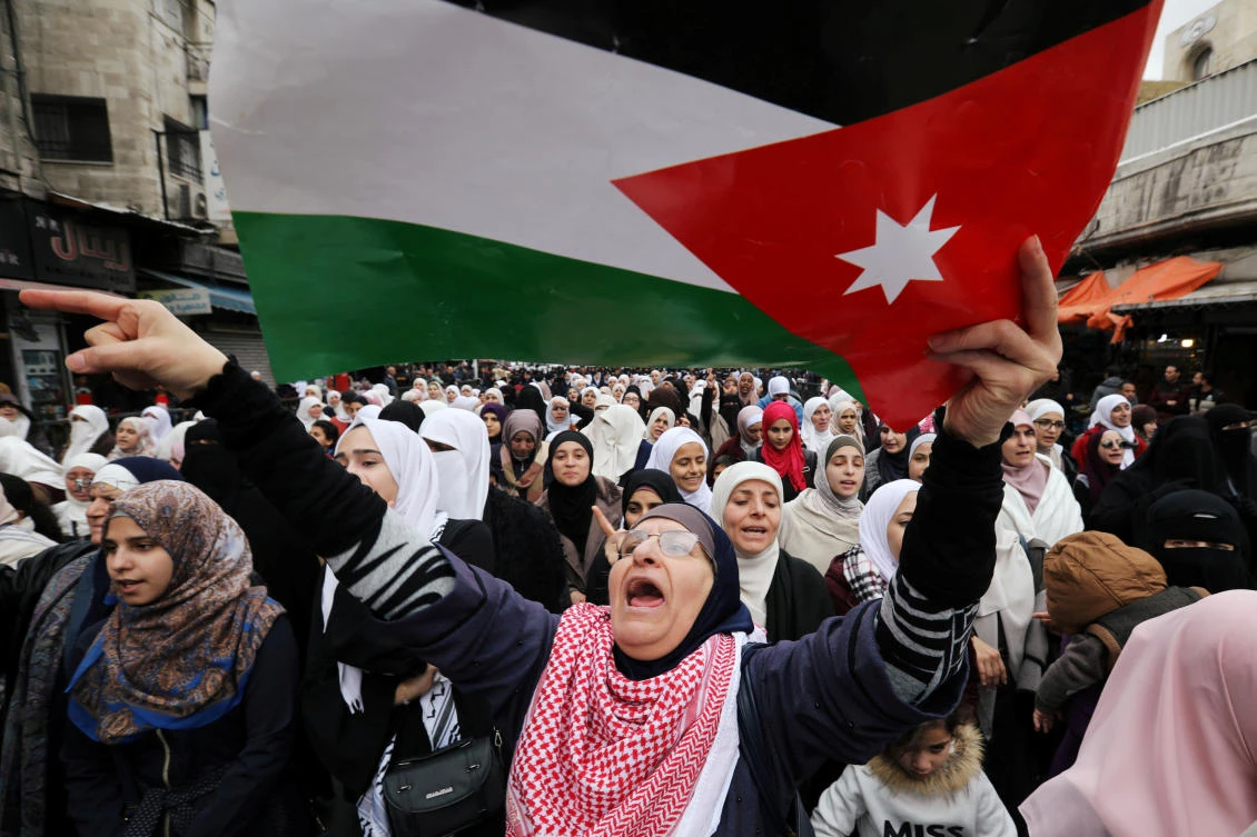 Demonstrators hold Jordanian national flags and chant slogans during a protest against a government's agreement to import natural gas from Israel, in Amman, Jordan January 17, 2020. (Reuters)