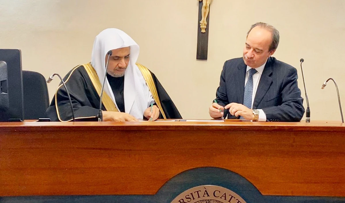 Dr. Mohammed bin Abdulkarim Al-Issa, secretary-general of the Muslim World League, and UCSC Rector Franco Anelli during the signing of a partnership agreement in Rome. (SPA)