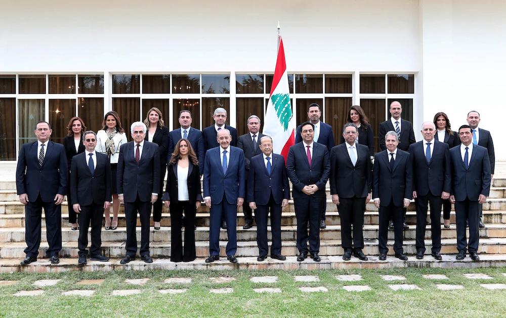 Members of the new Lebanese government pose for a picture at the presidential palace in Baabda, Lebanon Jan. 22, 2020. (Dalati Nohra/Handout via Reuters)