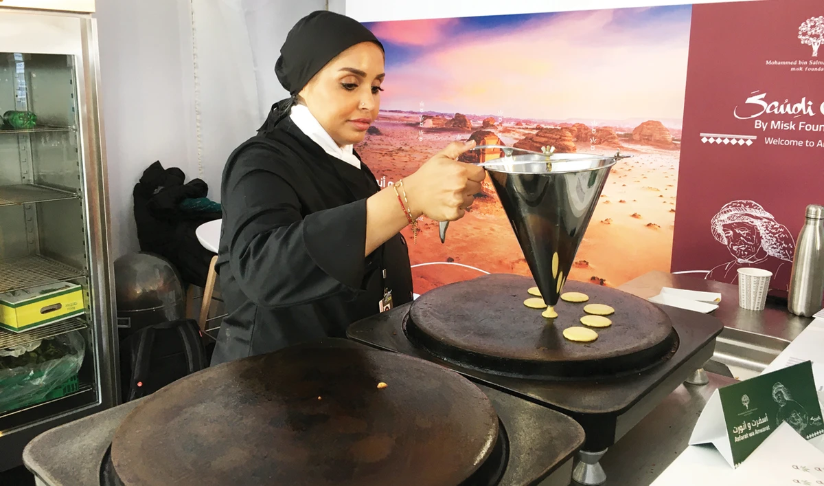 Traditional food can be found at the Saudi Cafe in Davos, whilst Saudi art and design is on display at the Misk Lighthouse on Promenade 62. (Arab News photo)
