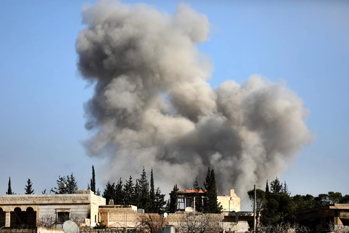 Smoke billows following a reported Syrian government airstrike in the town of Khan Al-Assal in Syria’s northwestern Aleppo province on January 22, 2020. (File/AFP)