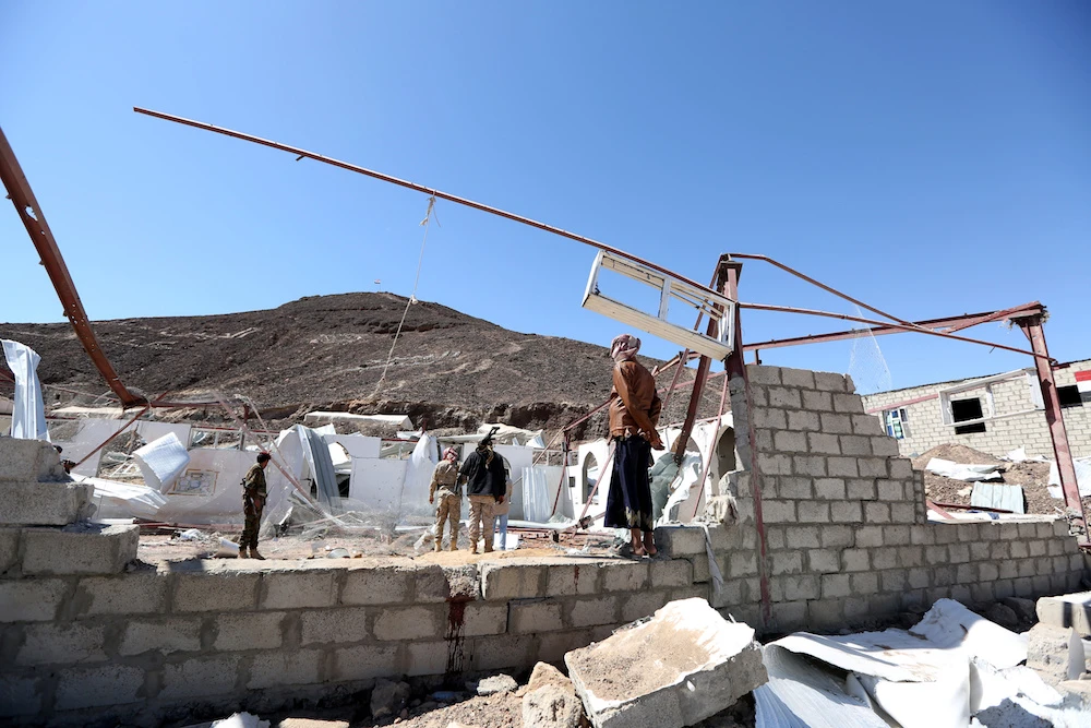 Government soldiers and other people inspect the site of a Houthi missile attack on a military camp’s mosque in Marib, Yemen Jan. 20, 2020. (File/Reuters)