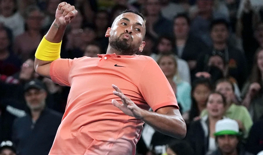 Australia’s Nick Kyrgios celebrates after beating Frenchman Gilles Simon. (AP)