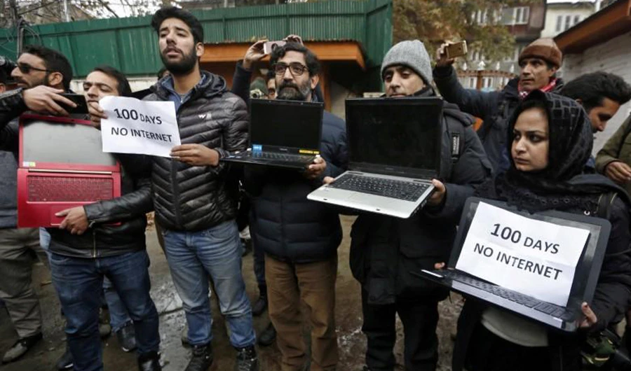 FILE PHOTO: Kashmiri journalists display laptops and placards during a protest demanding restoration of internet service, in Srinagar, November 12, 2019. (REUTERS)