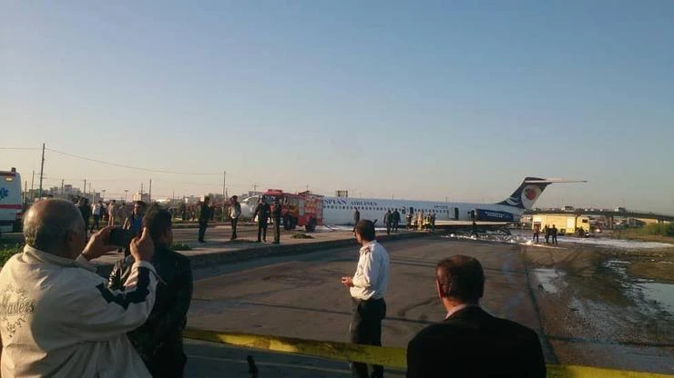 Aging Iran airliner crash-lands on highway, injuring only 2