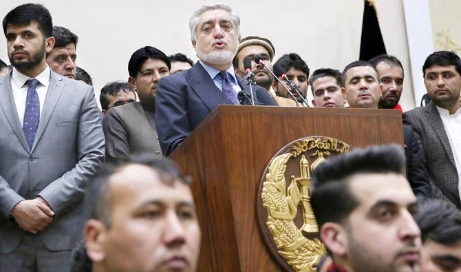 Afghanistan’s Chief Executive Dr. Abdullah Abdullah, center, addresses the media following a conference with his party members in Kabul on Sunday. (AP)
