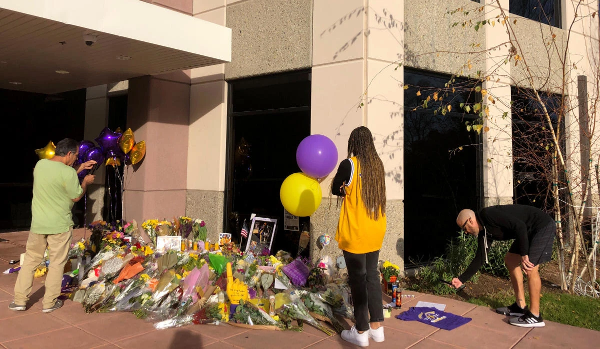 Sympathizers at a memorial at Mamba Sports Academy in Thousand Oaks, California, for the victims of the helicopter crash that resulted in the deaths of Kobe Bryant and eight others. (AP Photo)