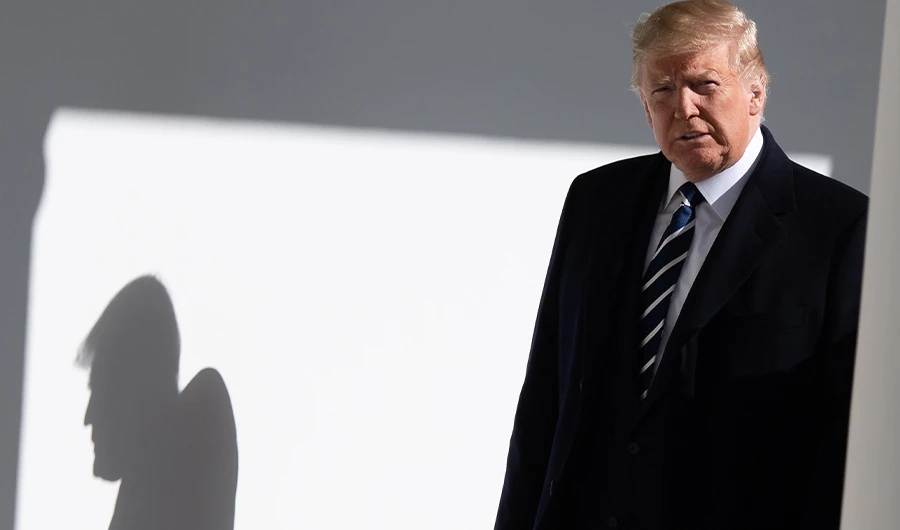 US President Donald Trump walks to hold a meeting with Israeli Prime Minister Benjamin Netanyahu at the White House in Washington, DC, January 27, 2020. (AFP)