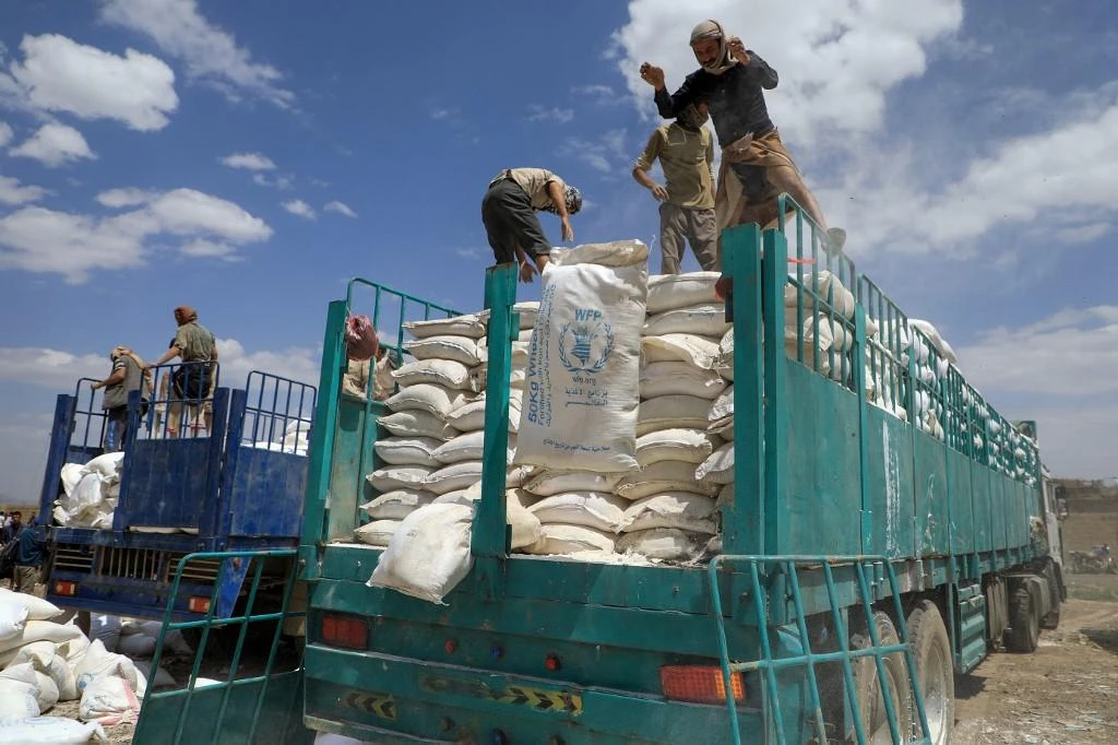 Millions of Yemenis live just a step away from famine and rely on food aid. (File/AFP)