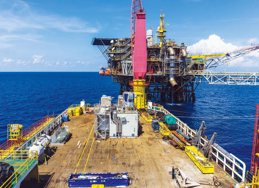 Exxon turnaround sapped by chemicals, refining