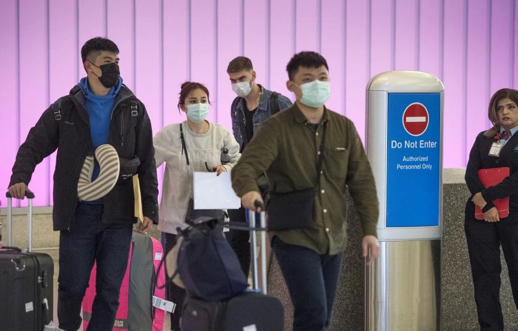 World health officials expressed ‘great concern’ that coronavirus is starting to spread between people outside of China. (AFP)