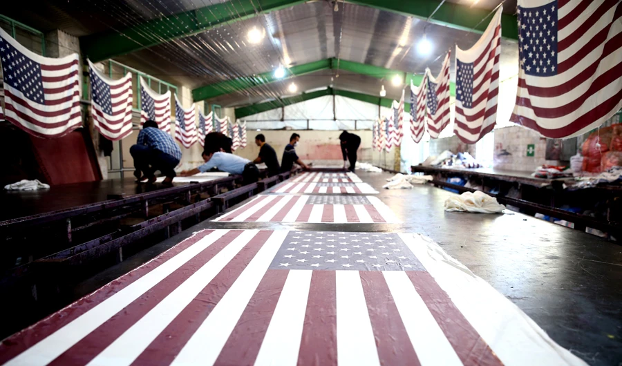 Iranian factory makes US and Israeli flags to burn
