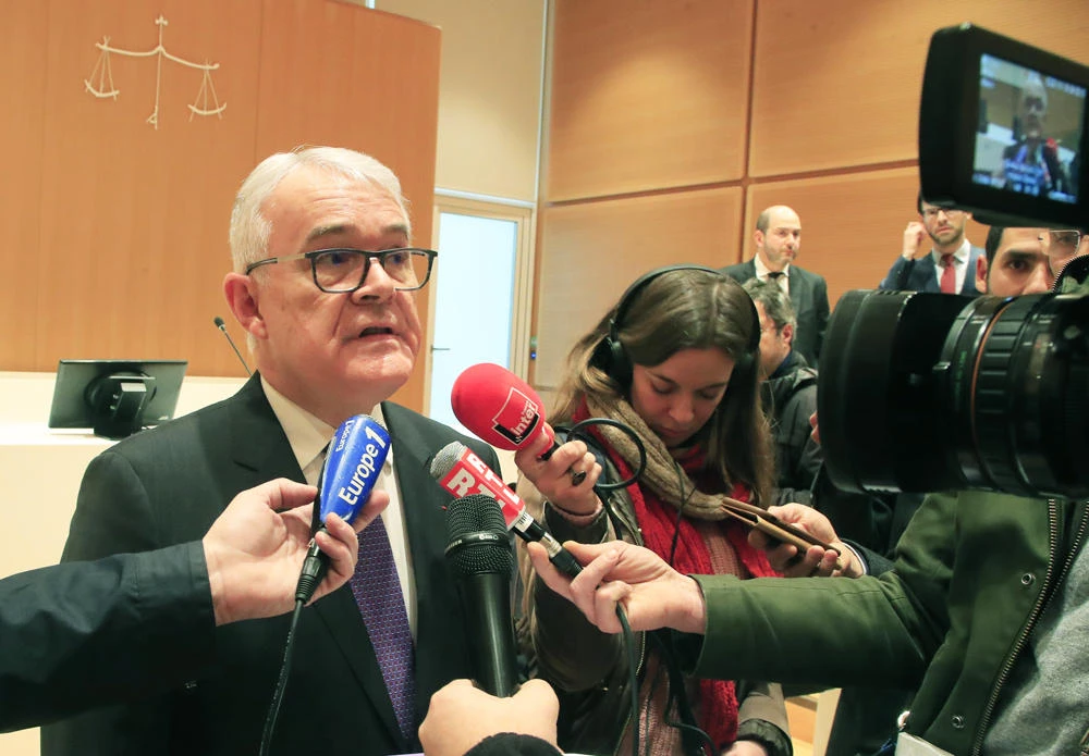 National Financial Prosecutor Jean Francois Bohnert speaks to the media at Paris court house on Jan. 31, 2020 after a French court approved an agreement with Airbus that would see the planemaker pay up to $4 billion to end years of corruption investigations by three countries. (AP Photo/Michel Euler)