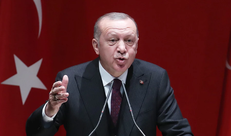 Turkish President and Leader of Turkey's ruling Justice and Development (AK) Party Recep Tayyip Erdogan delivers a speech during the party's extended meeting with provincial heads at the AK Party headquarters in Ankara, on January 31, 2020. (AFP)