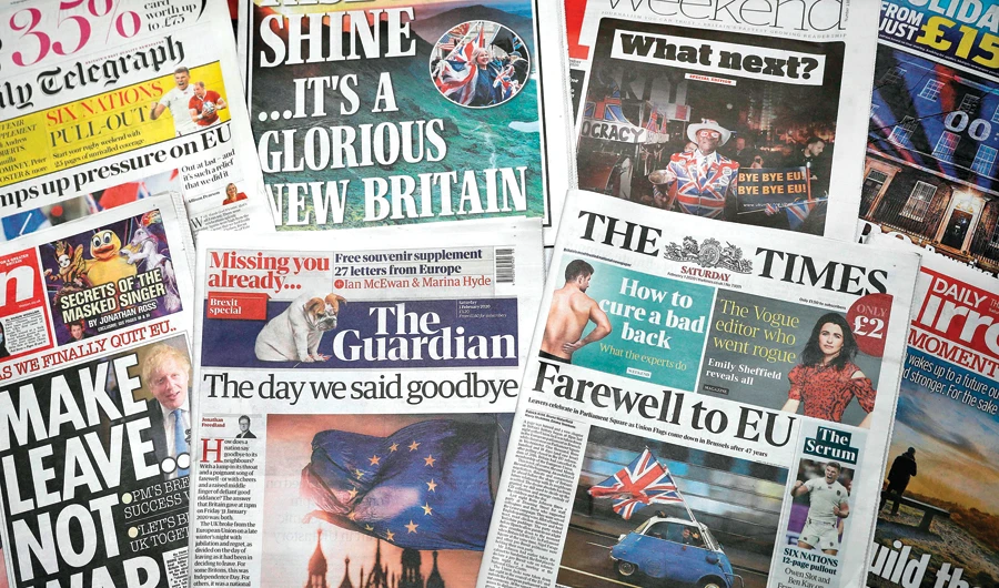 An arrangement of UK daily newspapers shows front page headlines reporting on the story that Britain became the first country to formally leave the EU. (AFP)