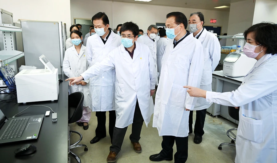 China reports 304 coronavirus deaths, fires officials for poor job