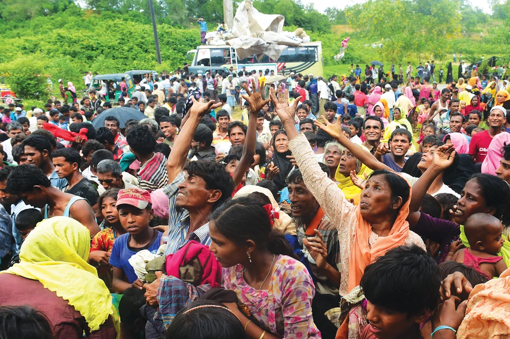 Rohingya rights activists claim that hundreds of refugees, including children, have been incarcerated for traveling without a permit, a rule which they allege is disproportionately imposed upon Rohingyas. (AFP)